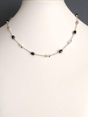 Dainty silver and black enamel necklace